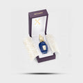 Xerjoff Torino 24 perfume bottle in elegant packaging, showcasing its luxurious design and vibrant blue color.